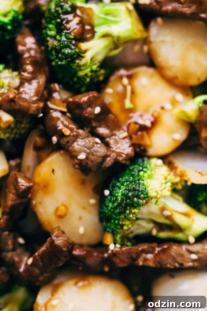 Best Easy Broccoli Beef Stir Fry Recipe - the easiest recipe that takes in the ballpark of 30 minutes to make and tastes better than takeout! #beefandbroccoli #broccolibeef #broccolibeefstirfry #stirfry #takeout | Littlespicejar.com