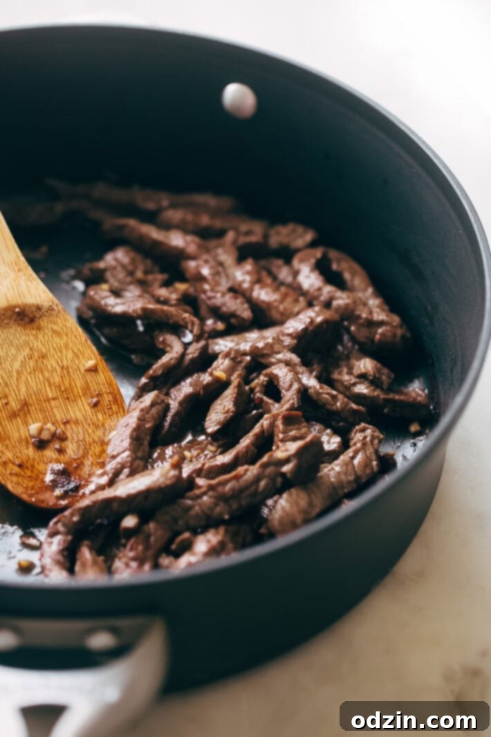 Best Easy Broccoli Beef Stir Fry Recipe - the easiest recipe that takes in the ballpark of 30 minutes to make and tastes better than takeout! #beefandbroccoli #broccolibeef #broccolibeefstirfry #stirfry #takeout | Littlespicejar.com