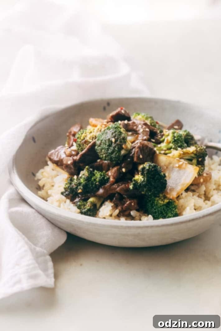 Best Easy Broccoli Beef Stir Fry Recipe - the easiest recipe that takes in the ballpark of 30 minutes to make and tastes better than takeout! #beefandbroccoli #broccolibeef #broccolibeefstirfry #stirfry #takeout | Littlespicejar.com
