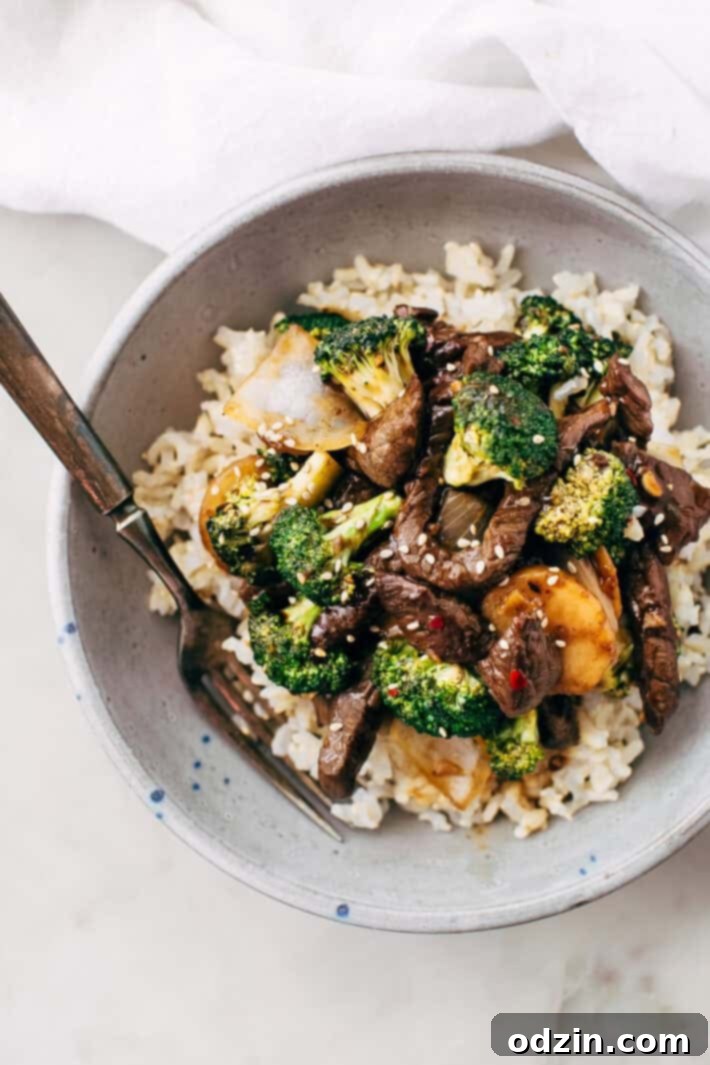 Best Easy Broccoli Beef Stir Fry Recipe - the easiest recipe that takes in the ballpark of 30 minutes to make and tastes better than takeout! #beefandbroccoli #broccolibeef #broccolibeefstirfry #stirfry #takeout | Littlespicejar.com