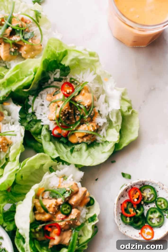 Bang Bang Chicken Lettuce Wraps - a homemade lettuce wrap stuffed with jasmine rice, sautéed chicken and tons of bang bang sauce! #bangbangchicken #bangbangsauce #bangbanglettucewraps #chickenlettucewraps | Littlespicejar.com Bang Bang Chicken Lettuce Wraps - a homemade lettuce wrap stuffed with jasmine rice, sautéed chicken and tons of bang bang sauce! #bangbangchicken #bangbangsauce #bangbanglettucewraps #chickenlettucewraps | Littlespicejar.com