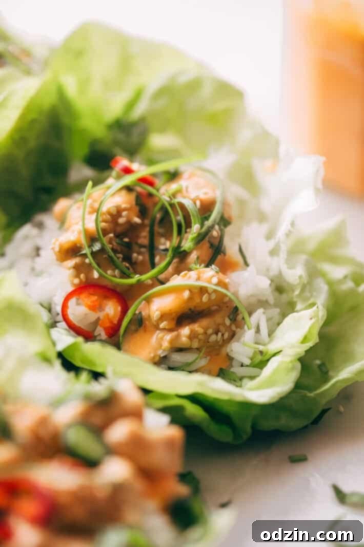 Bang Bang Chicken Lettuce Wraps - a homemade lettuce wrap stuffed with jasmine rice, sautéed chicken and tons of bang bang sauce! #bangbangchicken #bangbangsauce #bangbanglettucewraps #chickenlettucewraps | Littlespicejar.com Bang Bang Chicken Lettuce Wraps - a homemade lettuce wrap stuffed with jasmine rice, sautéed chicken and tons of bang bang sauce! #bangbangchicken #bangbangsauce #bangbanglettucewraps #chickenlettucewraps | Littlespicejar.com
