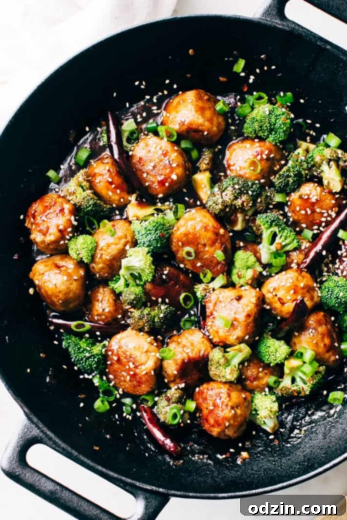 Raw chicken meatballs before cooking.