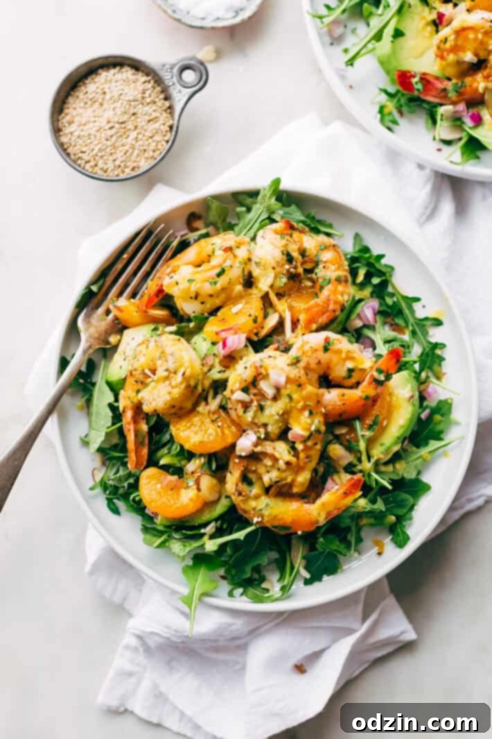 Avocado Shrimp Salad with Citrus Miso Dressing - learn how to make a quick and easy shrimp salad loaded with tons avocados, mandarin oranges, and sliced almonds! #shrimpsalad #salad #lowcarb #avocadoshrimpsalad | Littlespicejar.com