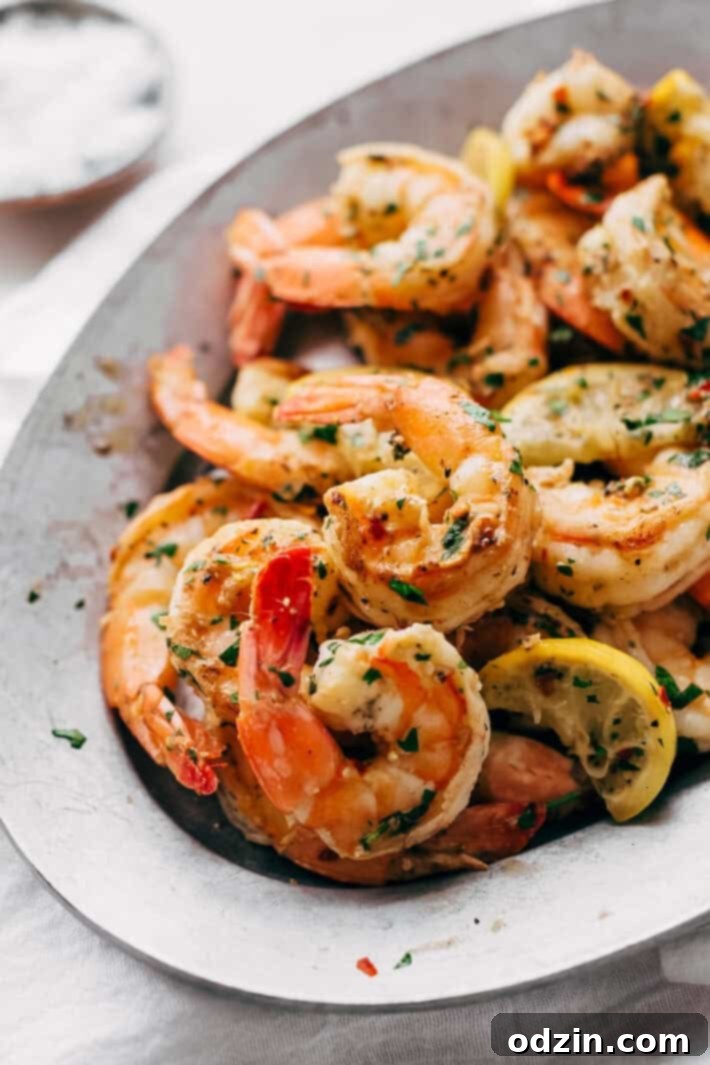 Avocado Shrimp Salad with Citrus Miso Dressing - learn how to make a quick and easy shrimp salad loaded with tons avocados, mandarin oranges, and sliced almonds! #shrimpsalad #salad #lowcarb #avocadoshrimpsalad | Littlespicejar.com