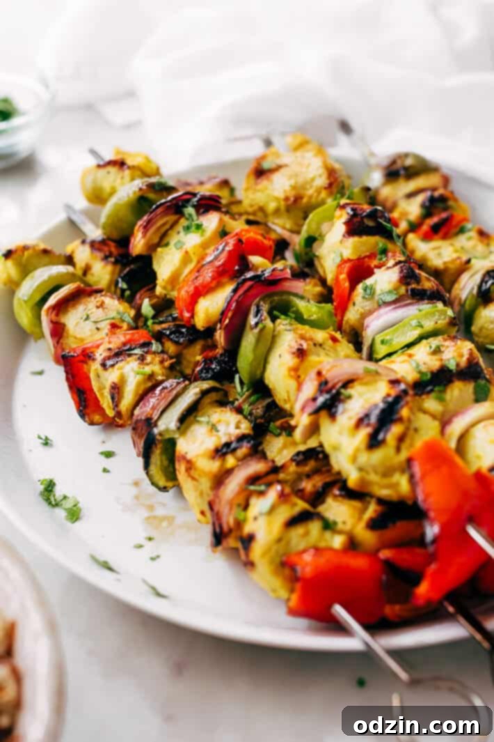 Easy Persian Chicken Kebabs - marinated in one secret ingredient that makes the chicken so tender it just melts in your mouth! #chickenkebabs #shishkebabs #persianchickenkebabs #jujehchicken | Littlespicejar.com Easy Persian Chicken Kebabs - marinated in one secret ingredient that makes the chicken so tender it just melts in your mouth! #chickenkebabs #shishkebabs #persianchickenkebabs #jujehchicken | Littlespicejar.com