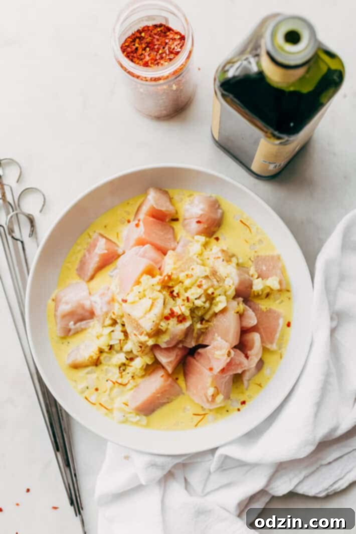 Easy Persian Chicken Kebabs - marinated in one secret ingredient that makes the chicken so tender it just melts in your mouth! #chickenkebabs #shishkebabs #persianchickenkebabs #jujehchicken | Littlespicejar.com Easy Persian Chicken Kebabs - marinated in one secret ingredient that makes the chicken so tender it just melts in your mouth! #chickenkebabs #shishkebabs #persianchickenkebabs #jujehchicken | Littlespicejar.com