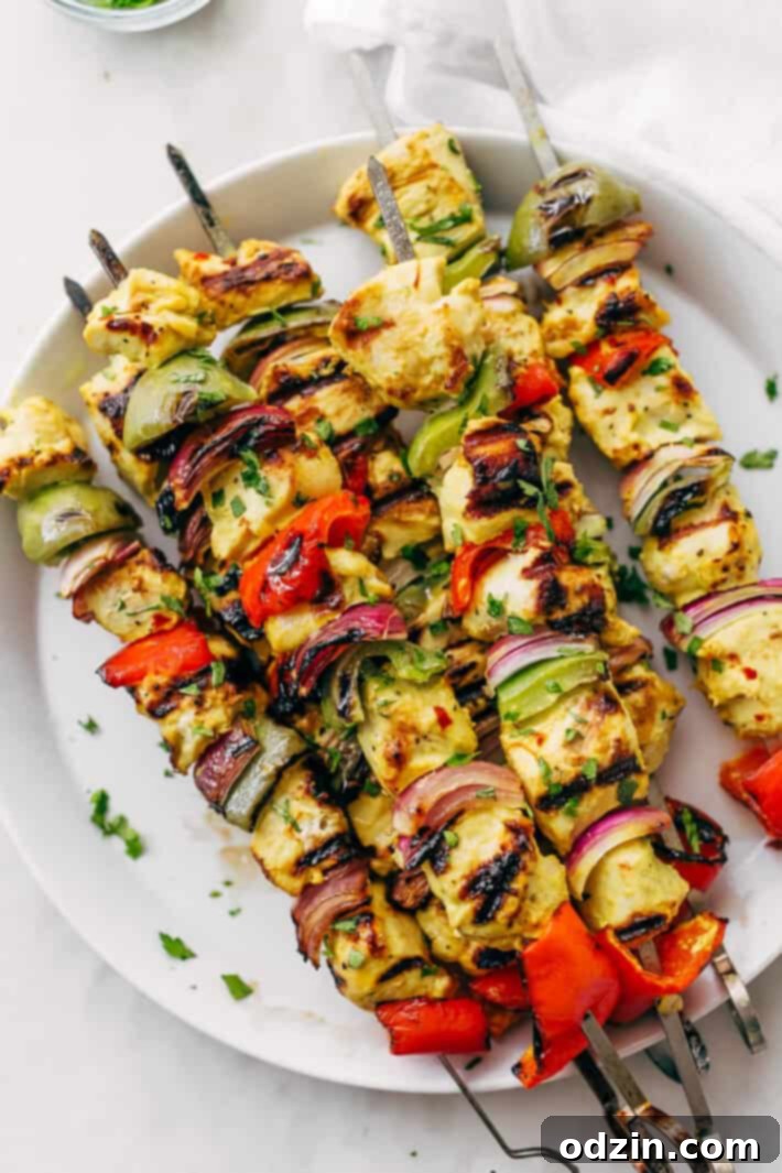 Easy Persian Chicken Kebabs - marinated in one secret ingredient that makes the chicken so tender it just melts in your mouth! #chickenkebabs #shishkebabs #persianchickenkebabs #jujehchicken | Littlespicejar.com Easy Persian Chicken Kebabs - marinated in one secret ingredient that makes the chicken so tender it just melts in your mouth! #chickenkebabs #shishkebabs #persianchickenkebabs #jujehchicken | Littlespicejar.com