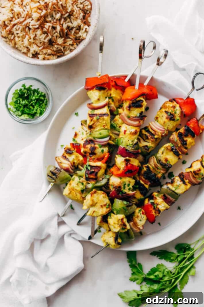 Easy Persian Chicken Kebabs - marinated in one secret ingredient that makes the chicken so tender it just melts in your mouth! #chickenkebabs #shishkebabs #persianchickenkebabs #jujehchicken | Littlespicejar.com Easy Persian Chicken Kebabs - marinated in one secret ingredient that makes the chicken so tender it just melts in your mouth! #chickenkebabs #shishkebabs #persianchickenkebabs #jujehchicken | Littlespicejar.com