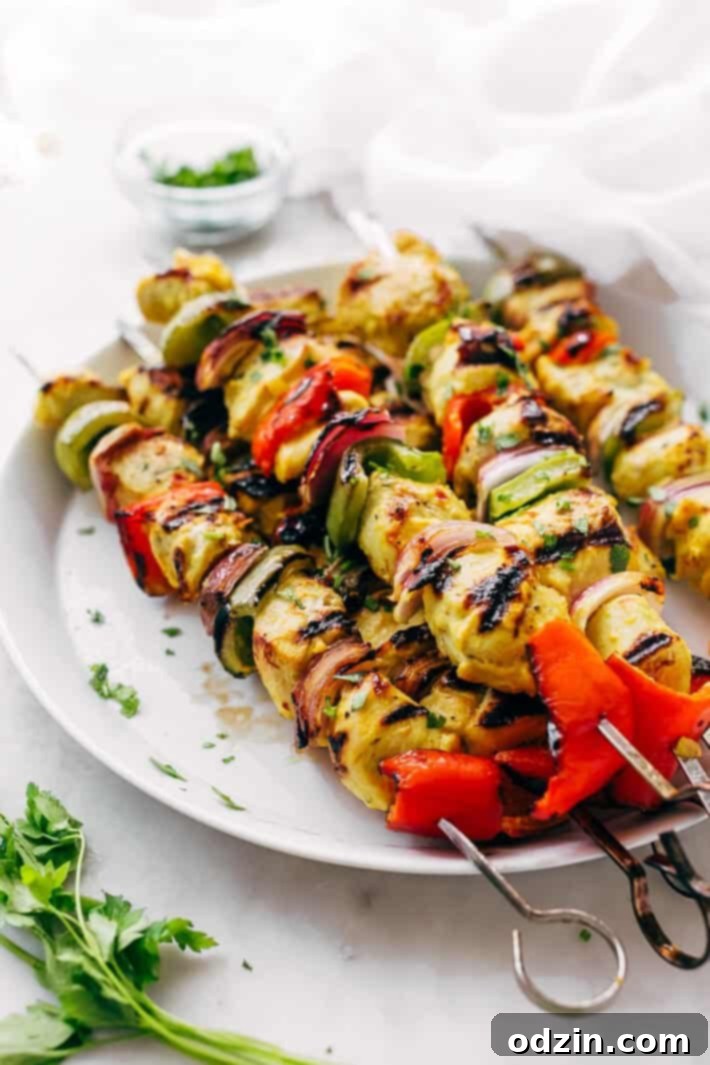 Easy Persian Chicken Kebabs - marinated in one secret ingredient that makes the chicken so tender it just melts in your mouth! #chickenkebabs #shishkebabs #persianchickenkebabs #jujehchicken | Littlespicejar.com Easy Persian Chicken Kebabs - marinated in one secret ingredient that makes the chicken so tender it just melts in your mouth! #chickenkebabs #shishkebabs #persianchickenkebabs #jujehchicken | Littlespicejar.com