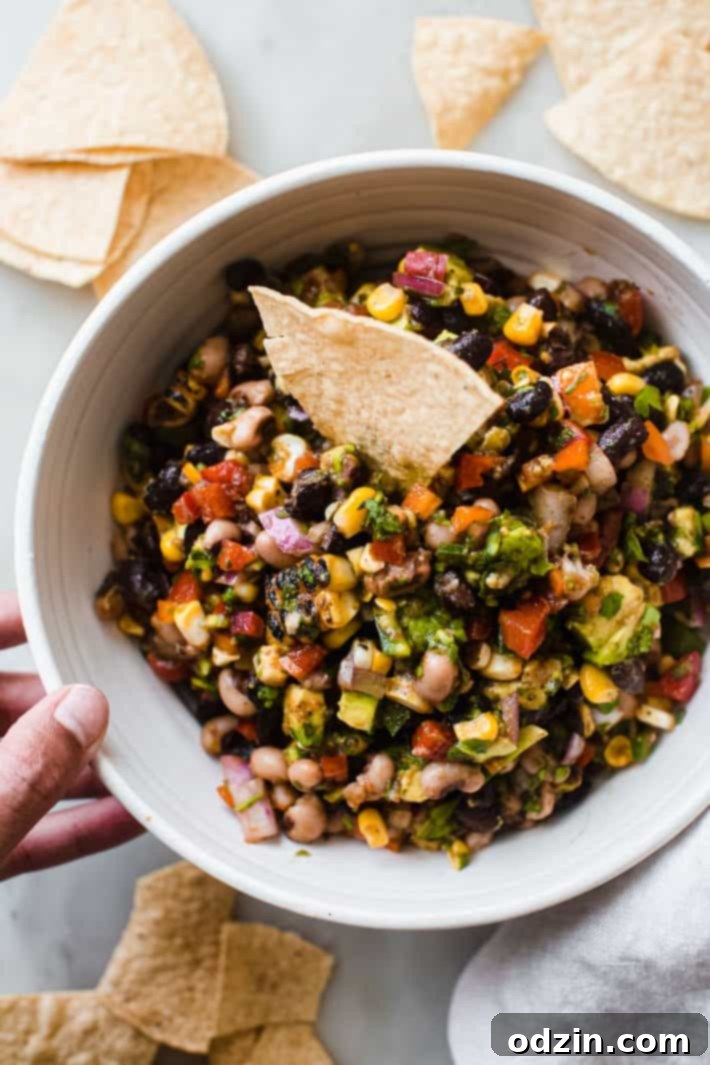 Texas Caviar in a bowl with tortilla chip