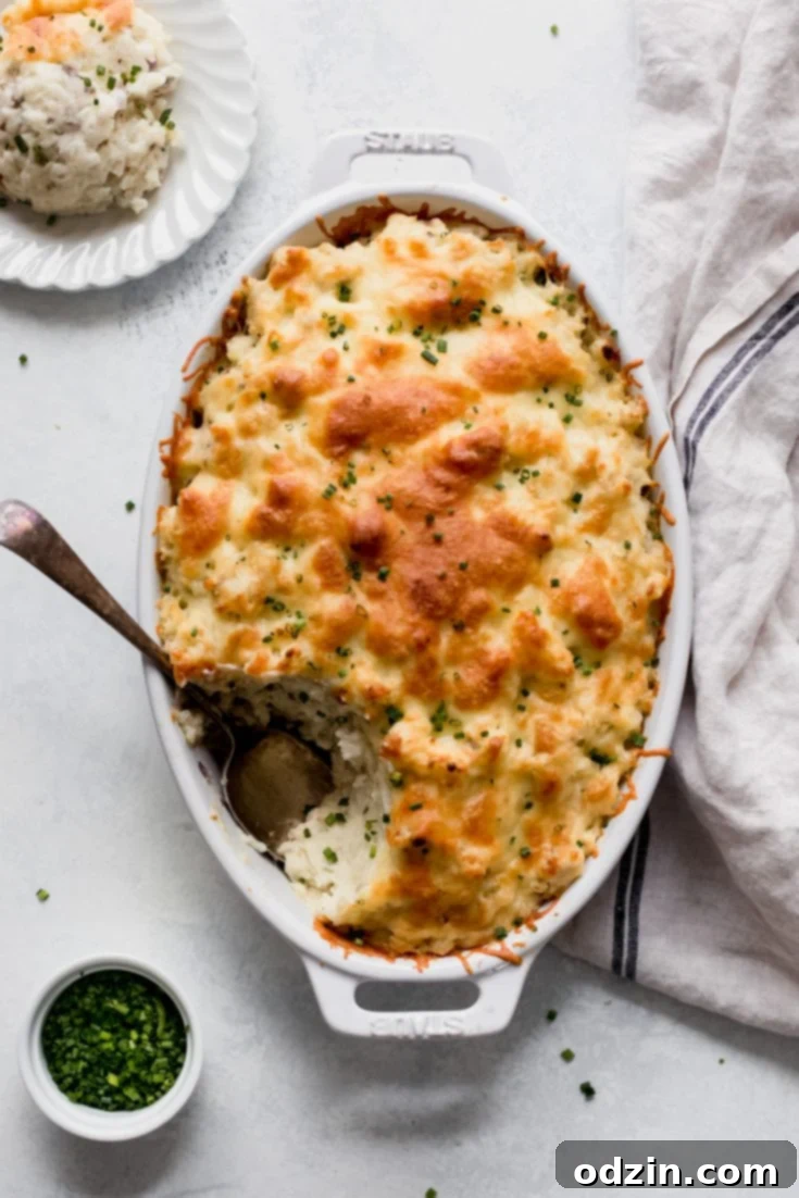 Pinterest Pin for Twice Baked Potato Casserole (Potatoes Romanoff) featuring a visually appealing image of the finished dish.