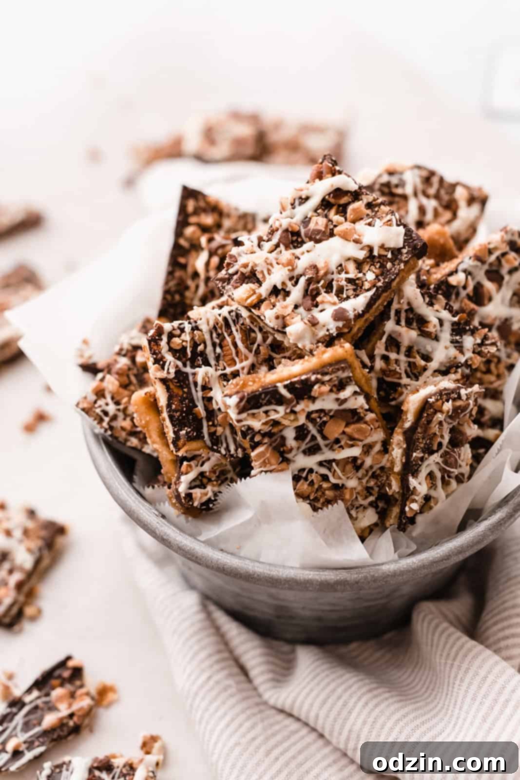 galvanized bucket full of broken pieces of Christmas crack
