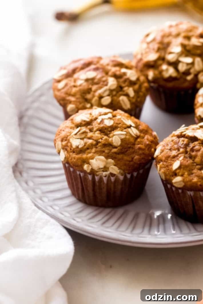 Healthy Maple Banana Nut Muffins - homemade banana nut muffins that are actually healthy for you! #maplebananamuffins #bananamuffins #banananutmuffins #healthy #baking | Littlespicejar.com