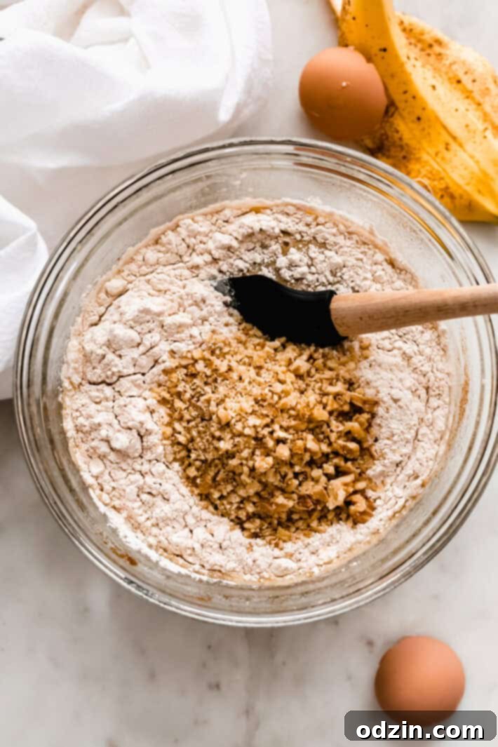 Healthy Maple Banana Nut Muffins - homemade banana nut muffins that are actually healthy for you! #maplebananamuffins #bananamuffins #banananutmuffins #healthy #baking | Littlespicejar.com