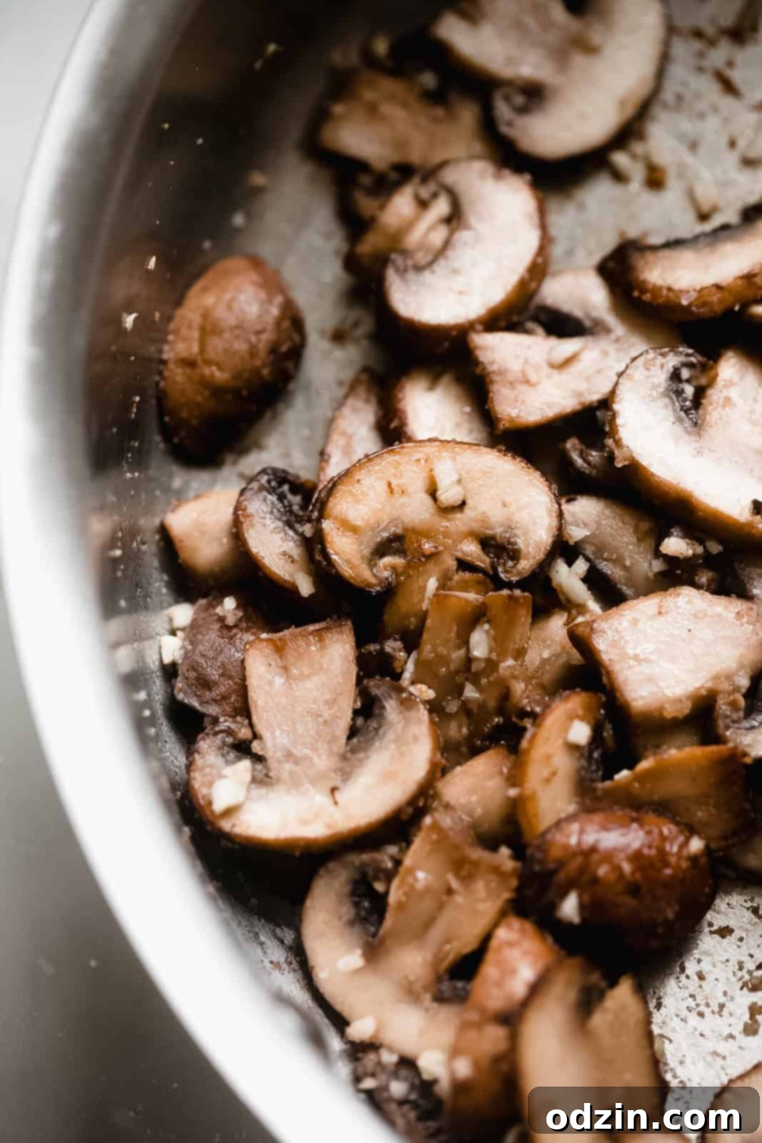 sautéed mushrooms and garlic in pan