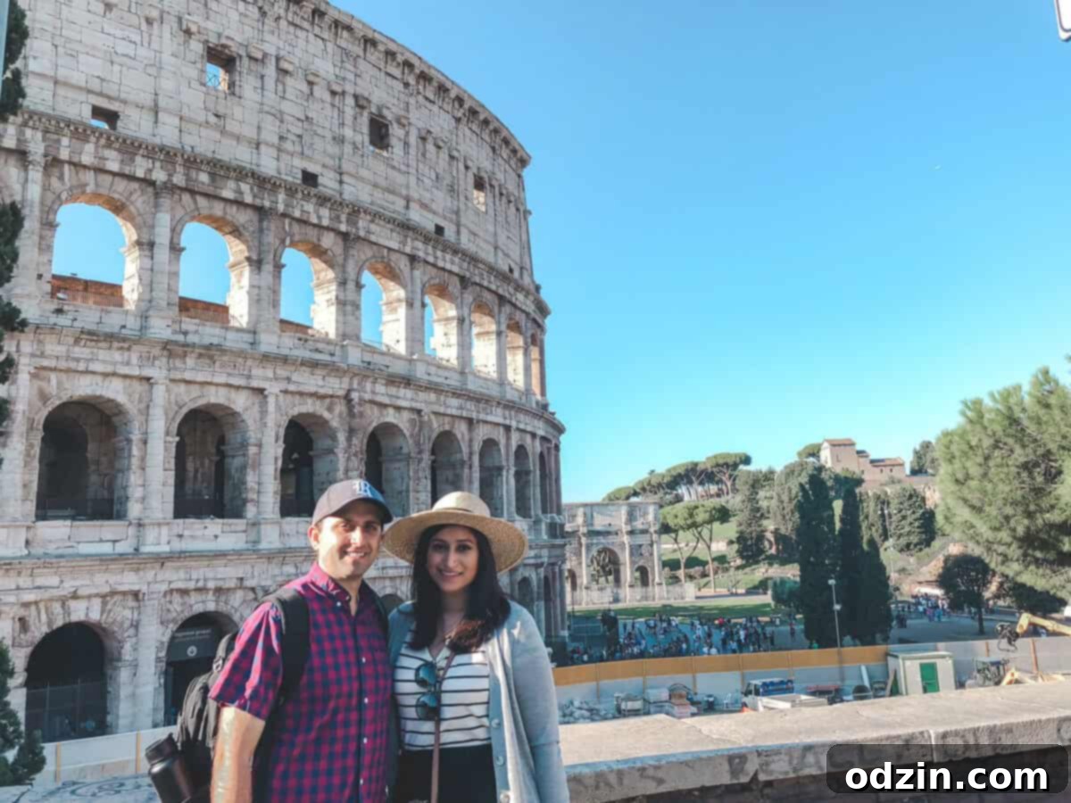early morning shot of hubby and me in front of the colosseum 