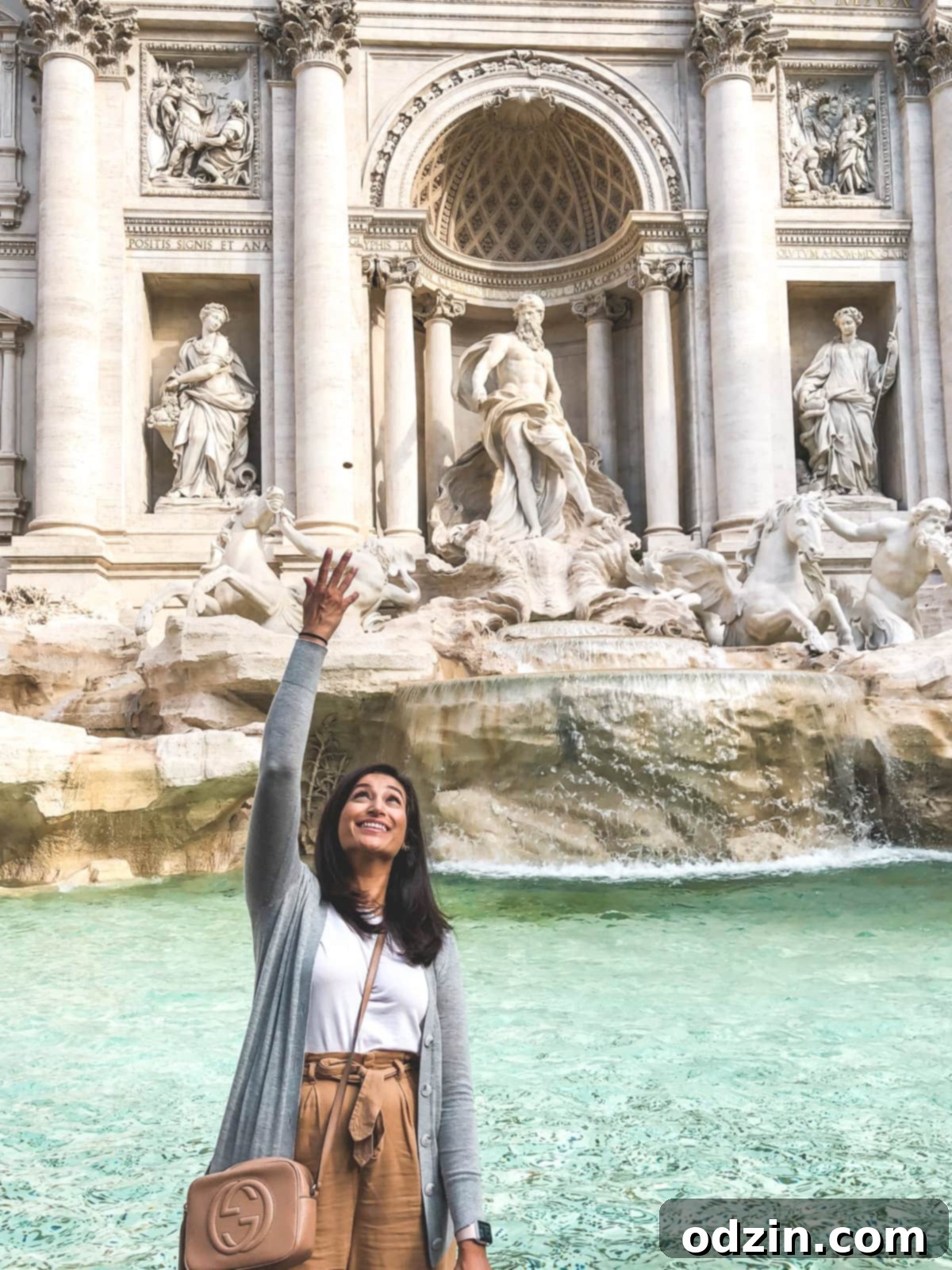me throwing a penny into the Trevi Fountain