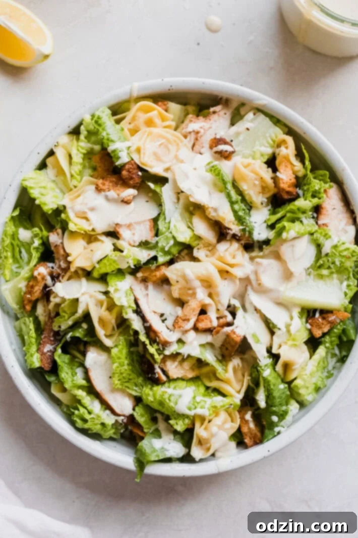 Creamy Chicken Tortellini Caesar Salad with homemade croutons, grilled chicken, and fresh tortellini