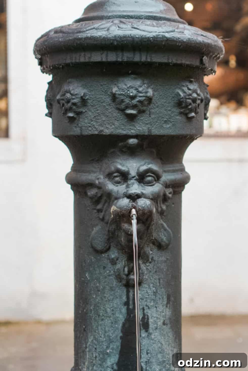 free flowing water through a an iron water fountain