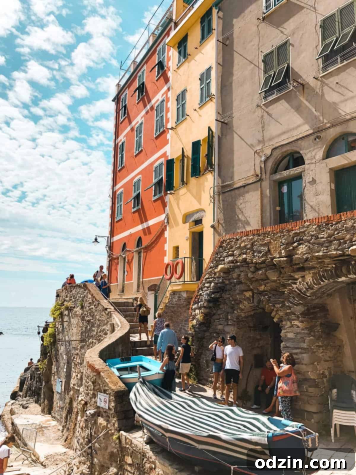 orange and yellow buildings that line the waterside on Riomaggiore 