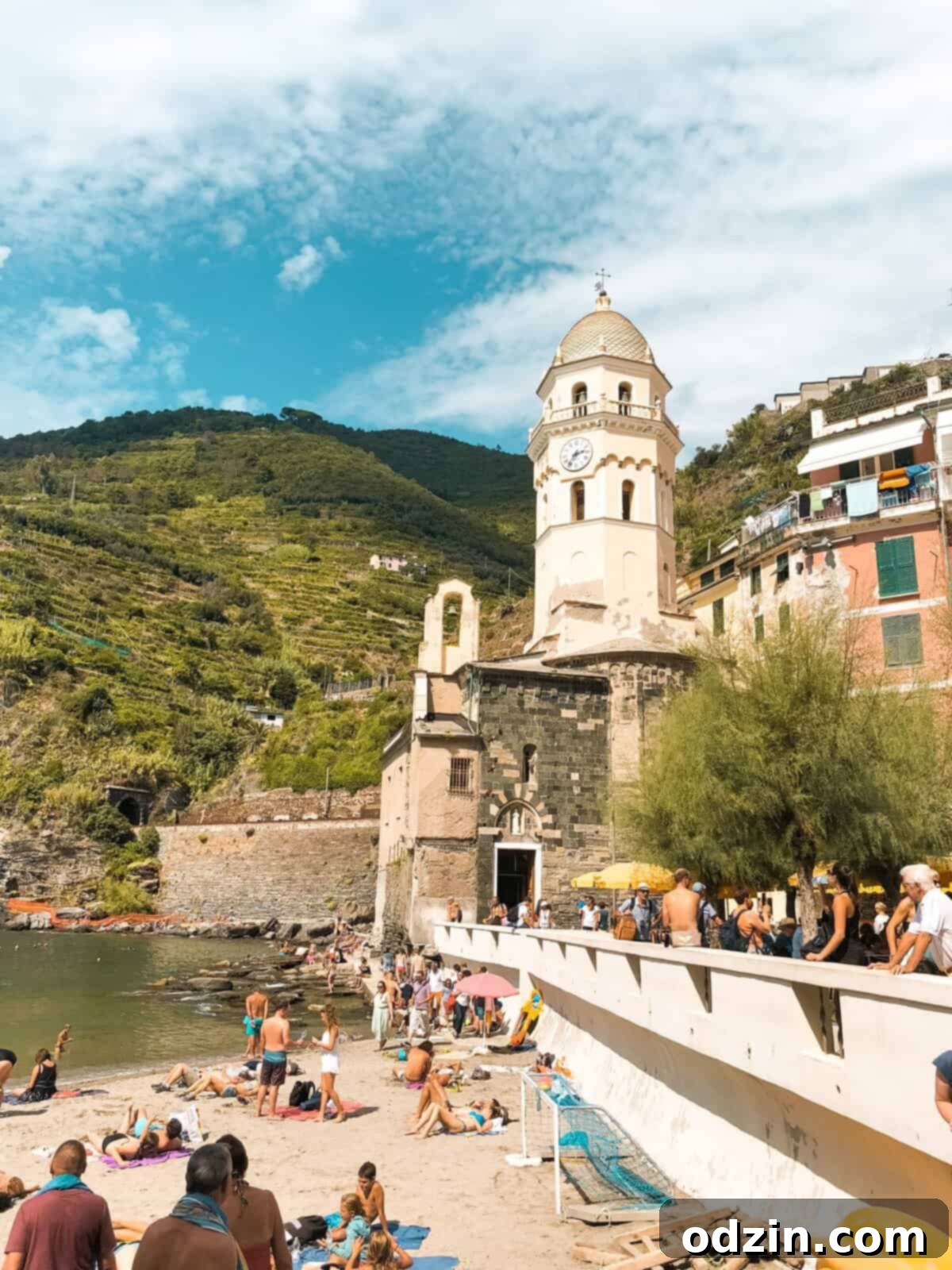 the iconic yellow building in the harbor of Vernazza