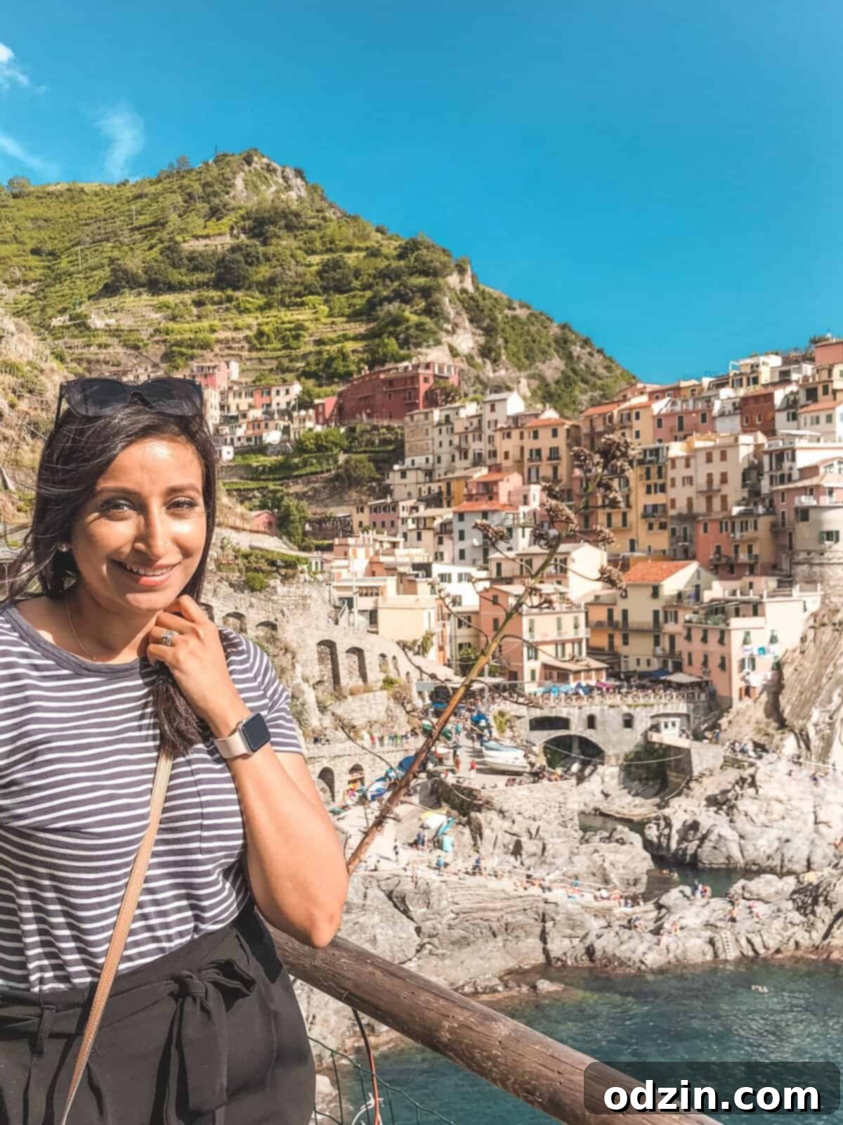 me standing with the village of Vernazza behind me