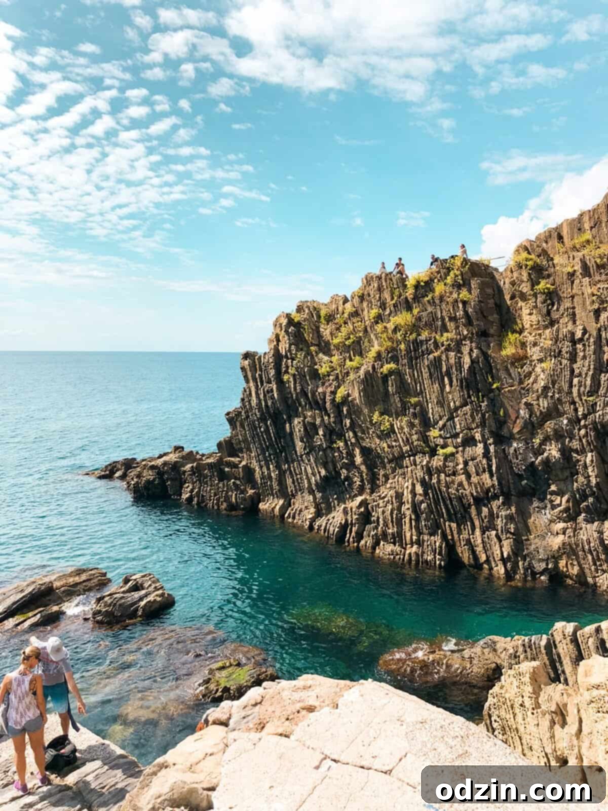 a cliff off the coast of the fishing villages of Cinque Terre