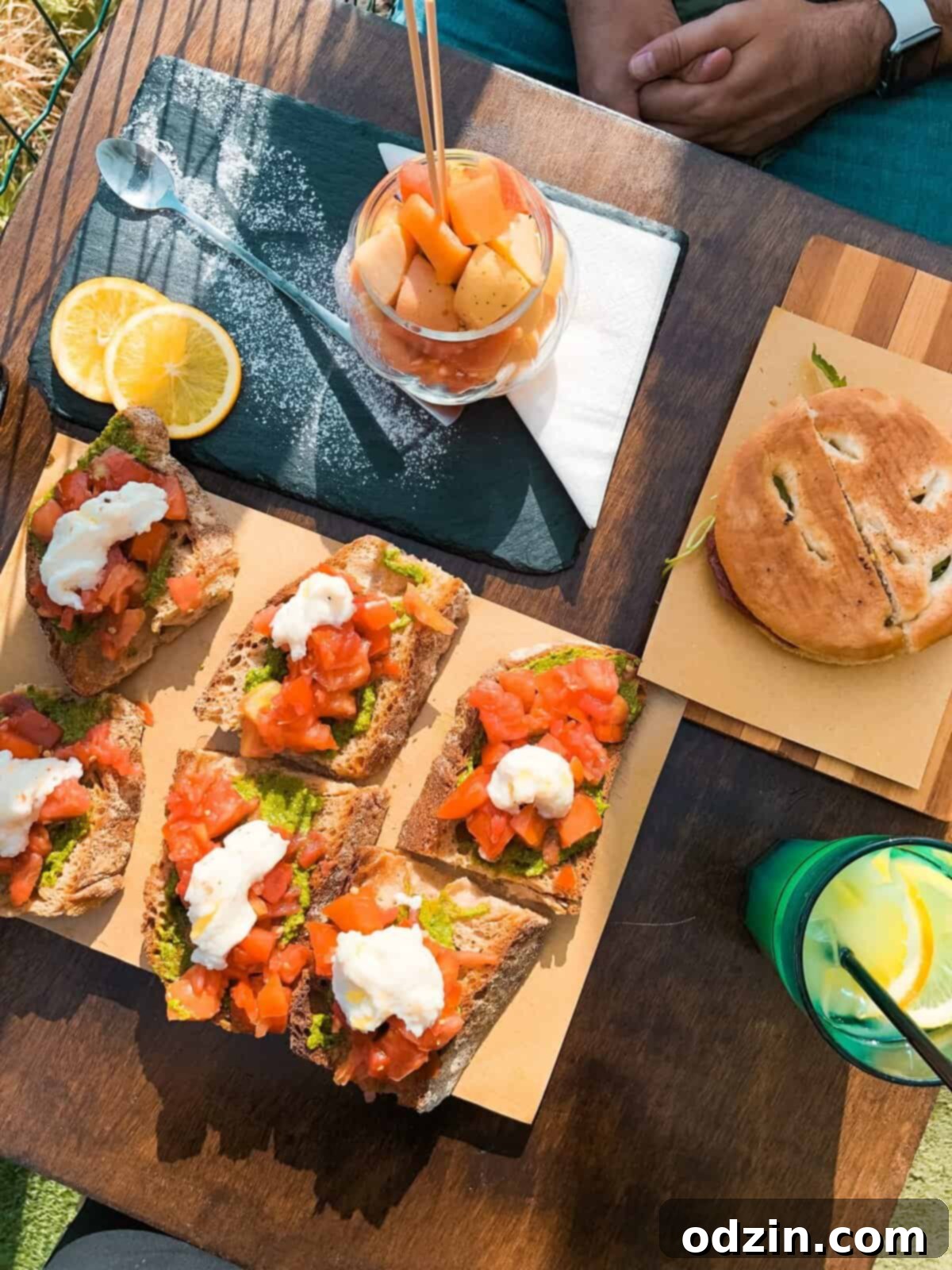 bruschetta, fruit salad, and sandwich from Nessun Dorma