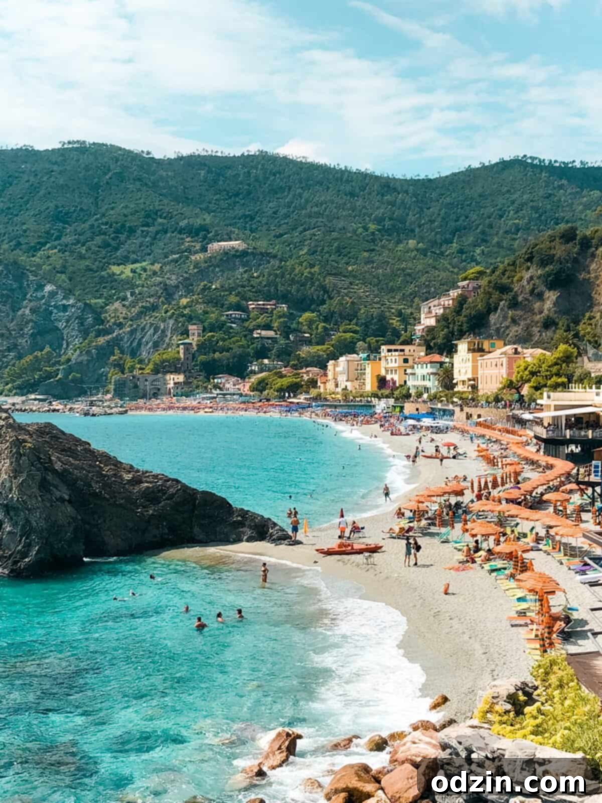 beachside lined with orange umbrellas on Monterreso