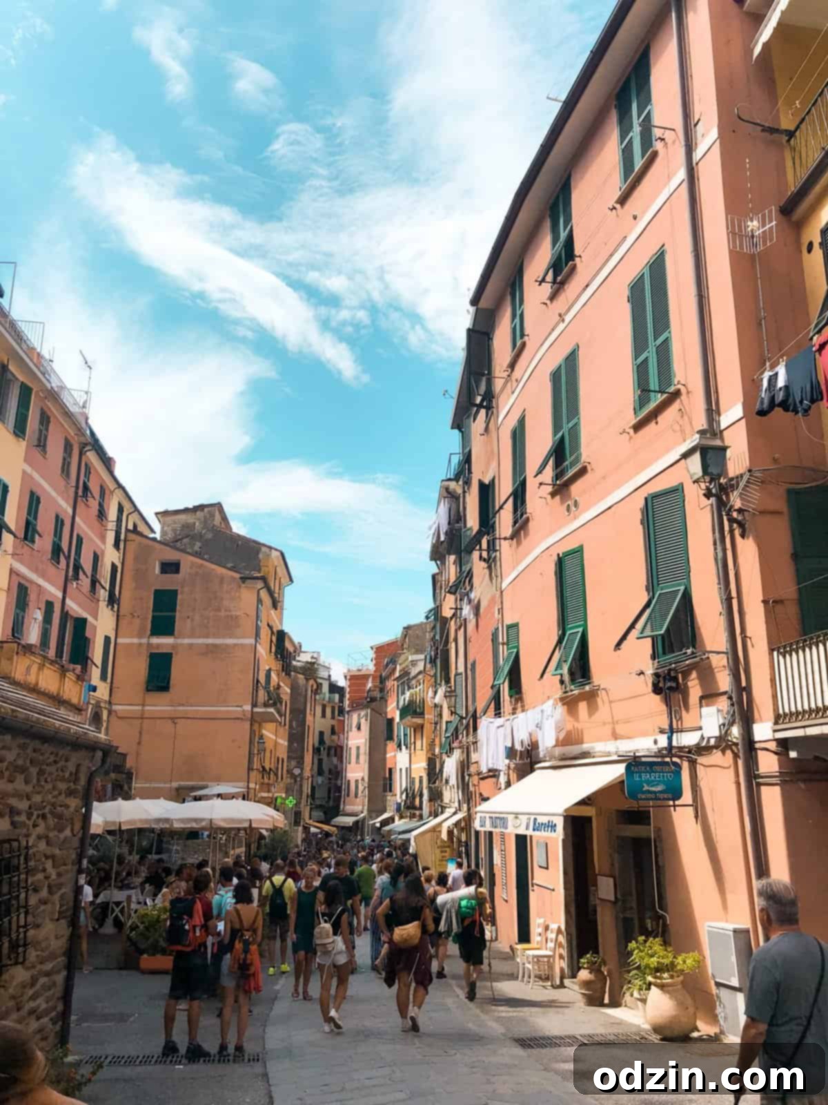 colorful buildings under a blue sky in Manarola, Cinque Terre
