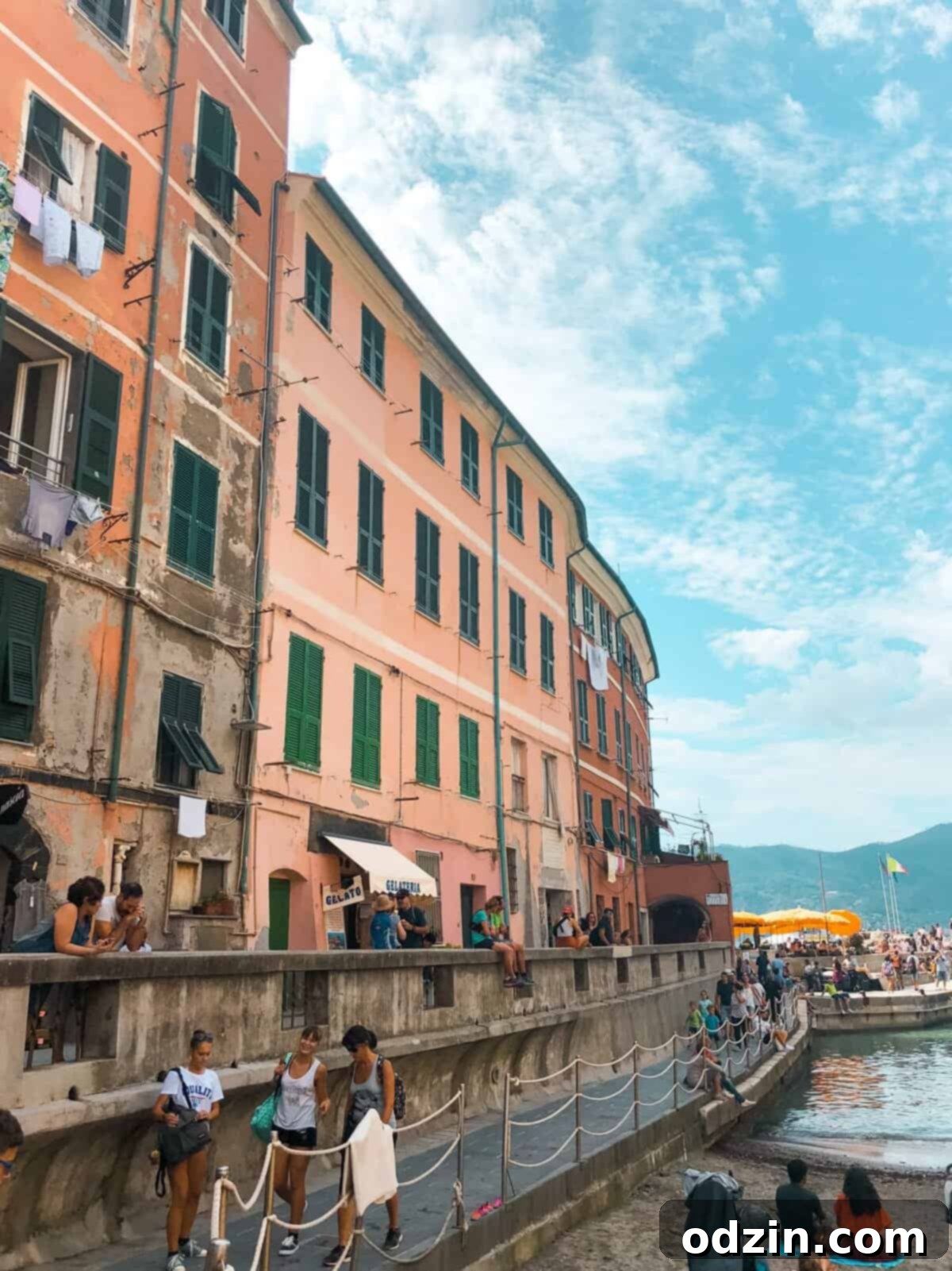 orange buildings lining the water side on Riomaggiore