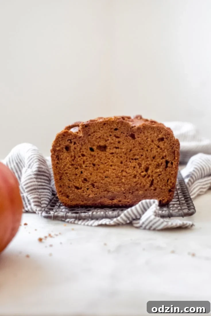 Long image for Pinterest showing Spiced Brown Butter Pumpkin Bread recipe details