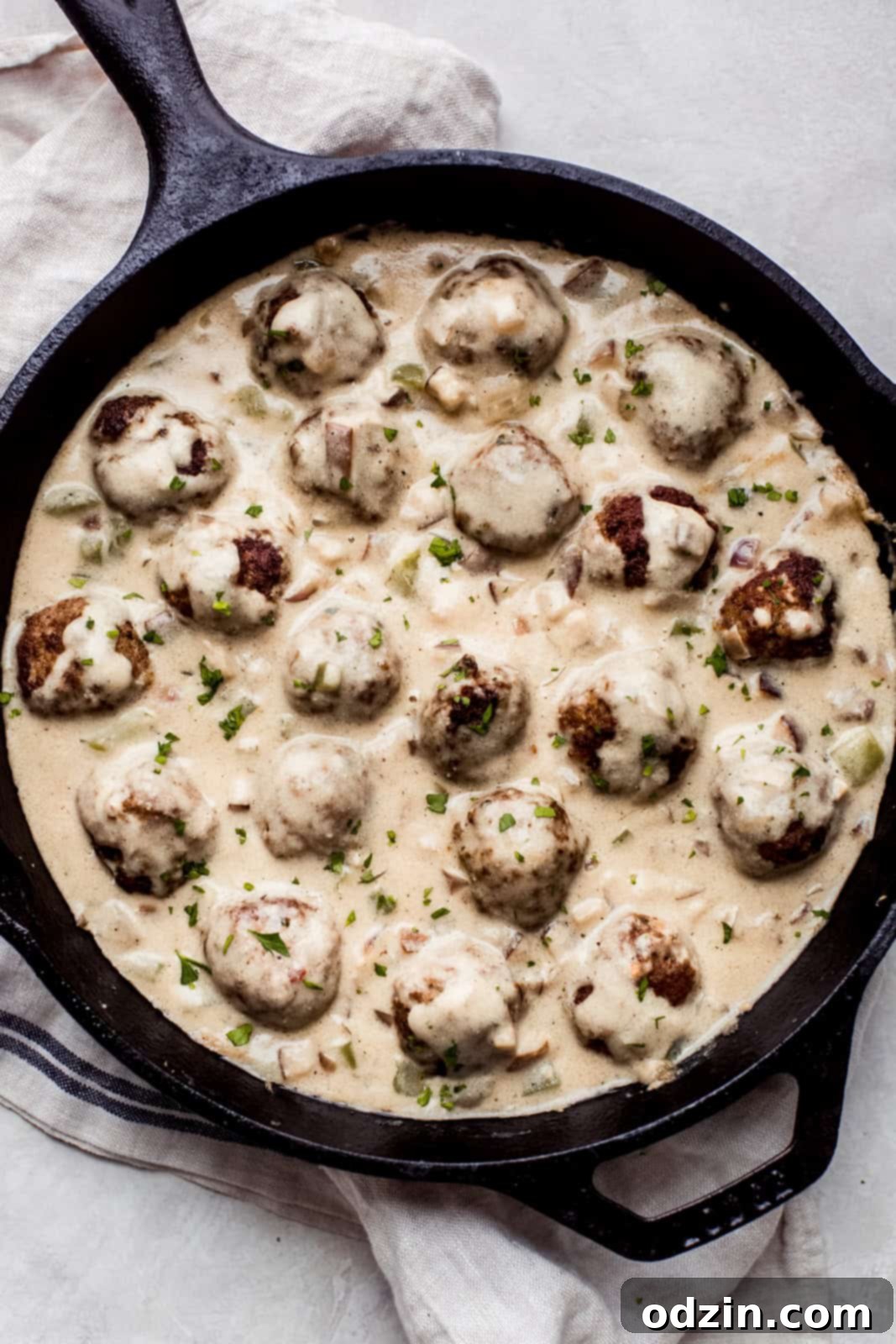 Philly Cheesesteak Meatballs with Creamy Garlic Cheese Sauce 7 prepared seared meatballs in cheese sauce