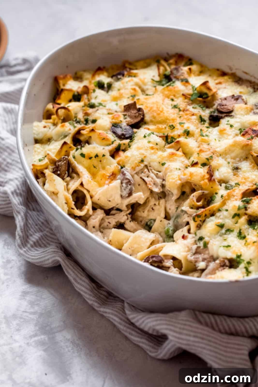 Cozy Leftover Turkey Pasta Bake Works With Chicken Too 3 side shot of pasta bake topped with melted cheese