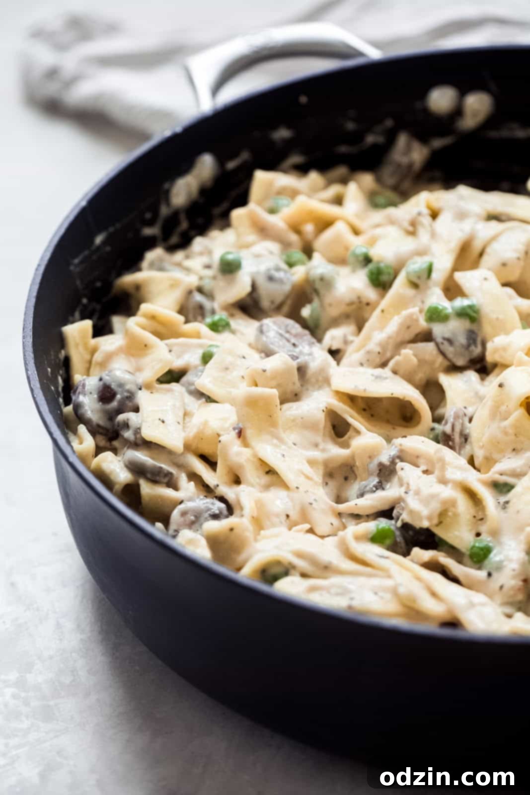 Cozy Leftover Turkey Pasta Bake Works With Chicken Too 6 noodles, peas, turkey, and mushrooms in a creamy sauce