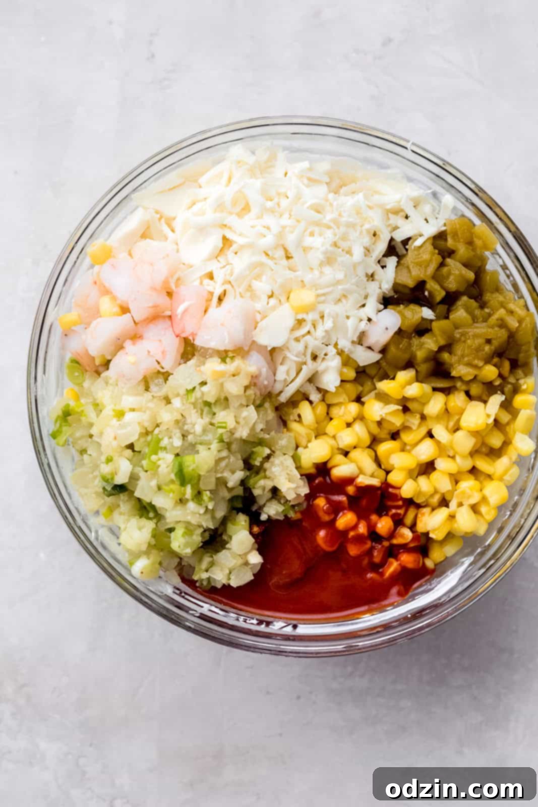 bowlful of all the fresh chipotle corn dip ingredients ready to be mixed