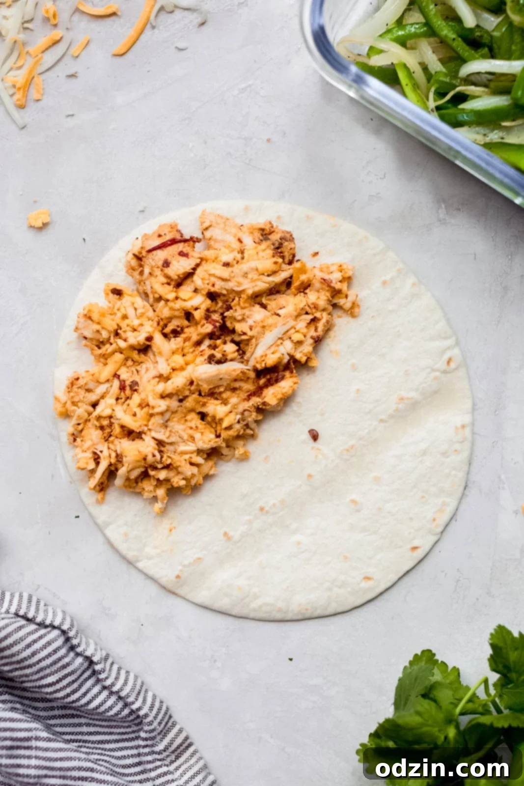 Oven-Crisped Chicken Quesadillas 5 chicken quesadilla mixture on half of a tortilla