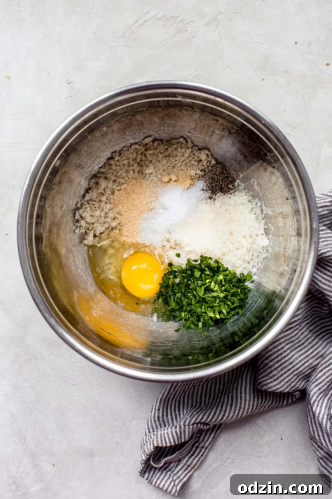 metal bowl with chicken meatballs mixture