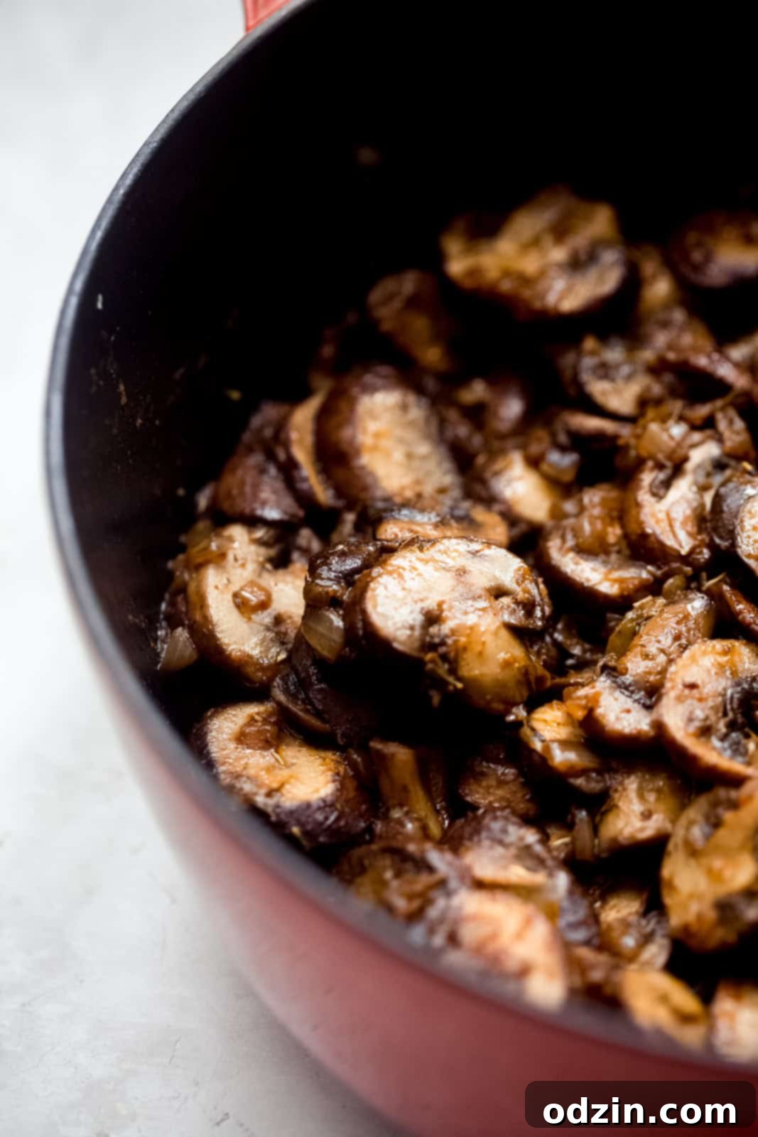 Rich & Comforting Hungarian Mushroom Soup 6 close up of sautéed mushrooms in a pot