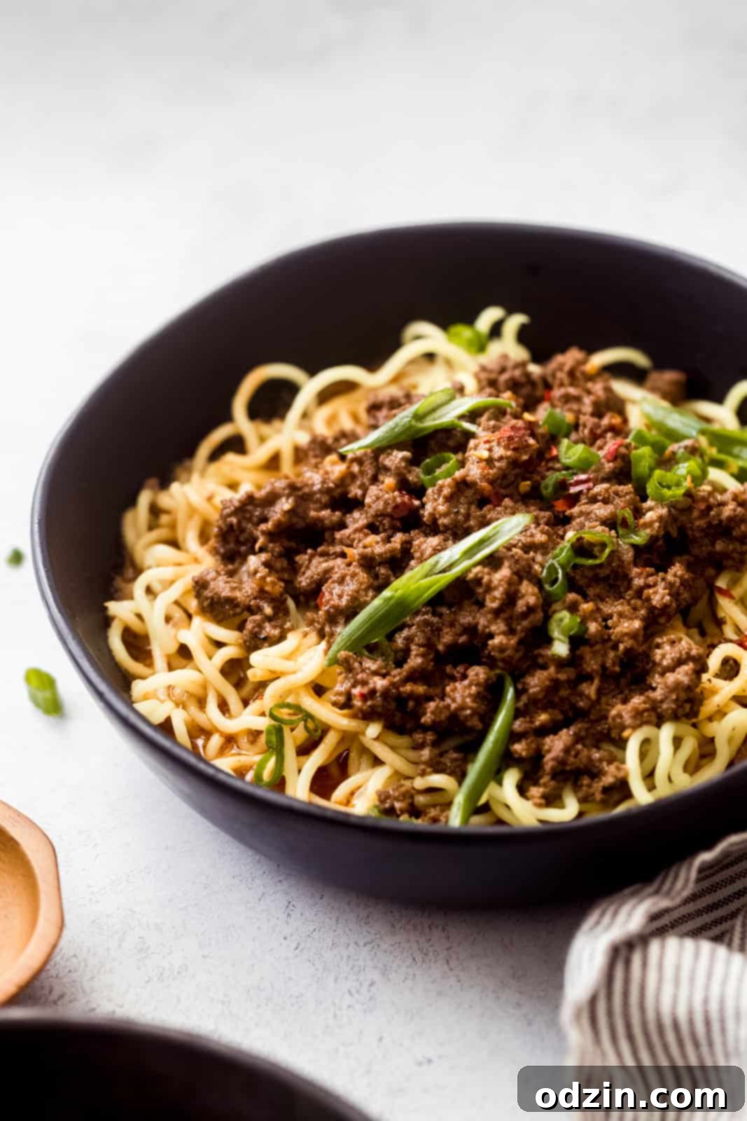 black bowl with dan dan noodles side shot