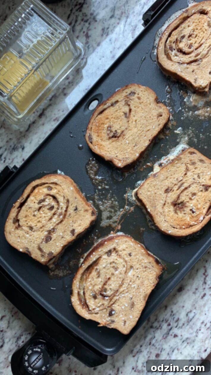 cooking cinnamon swirl french toast on flat top