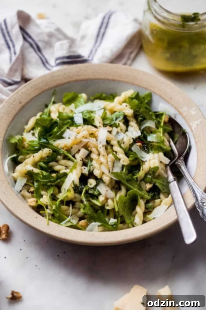 lemon basil arugula salad in a bowl lemon basil arugula salad in a bowl