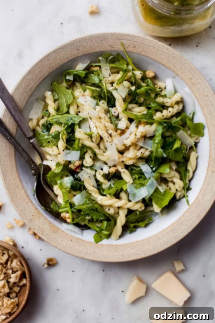 lemon basil arugula salad in a bowl lemon basil arugula salad in a bowl