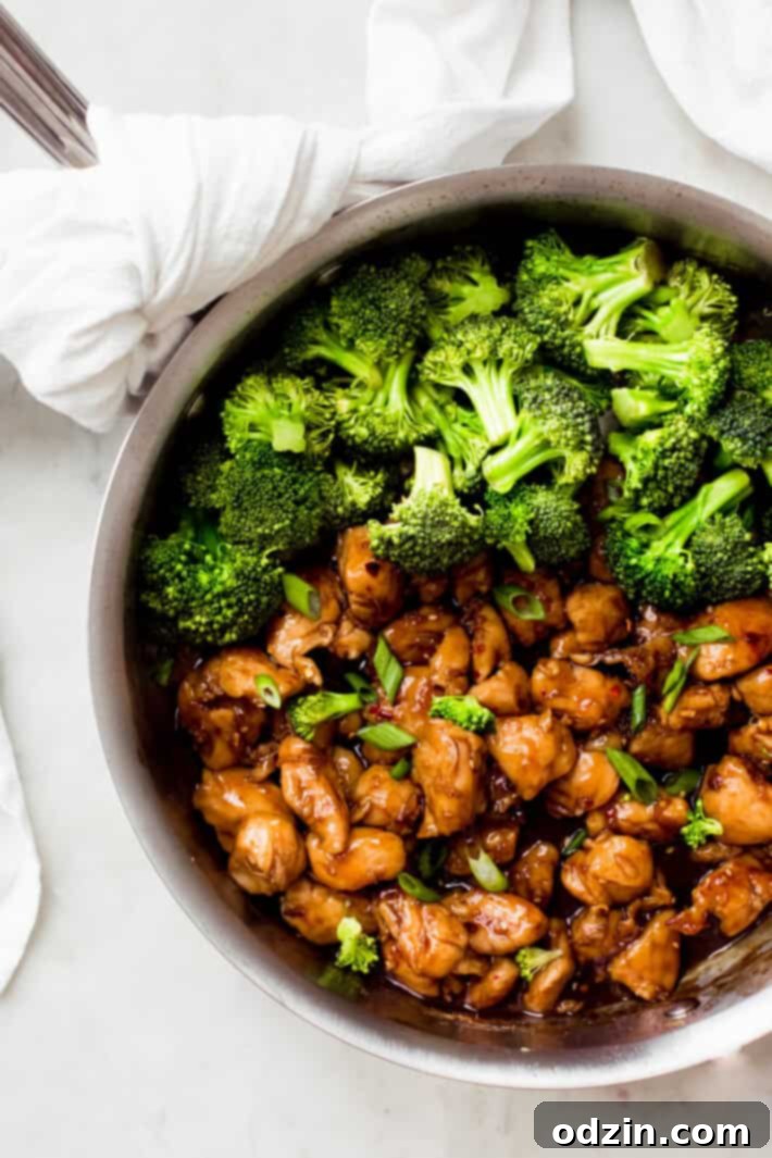 chicken teriyaki in a pan with broccoli
