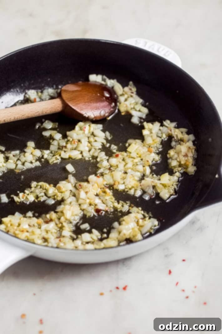 sautéed onions in a cast iron skillet sautéed onions in a cast iron skillet