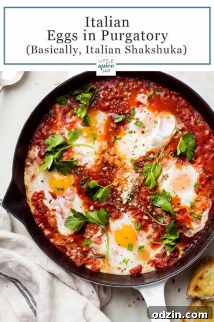 Spicy Tuscan Eggs 2 close up of white skillet with italian style eggs poached in tomato sauce