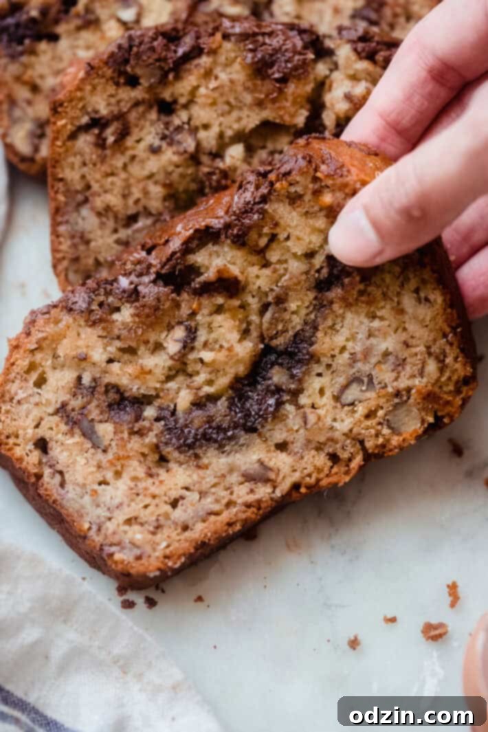 close up of sliced chocolate hazelnut banana bread