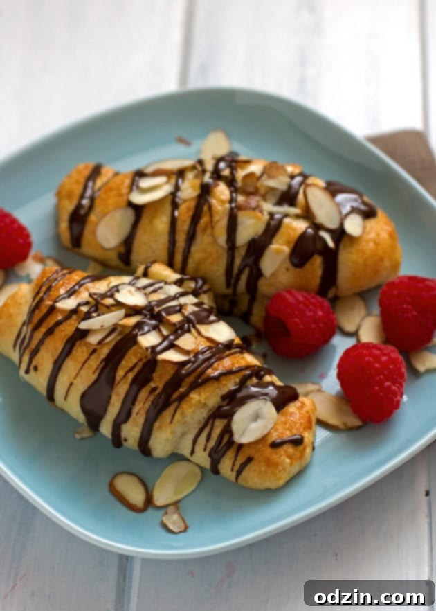 Plate of freshly baked 5-ingredient raspberry almond chocolate crescents