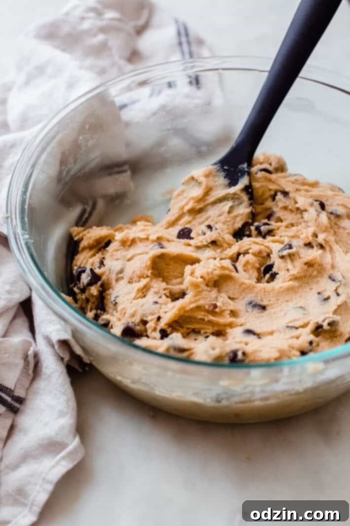 Ultimate Chewy Chocolate Chip Cookies 5 Homemade chocolate chip cookie dough batter, covered and ready to be chilled in the refrigerator.